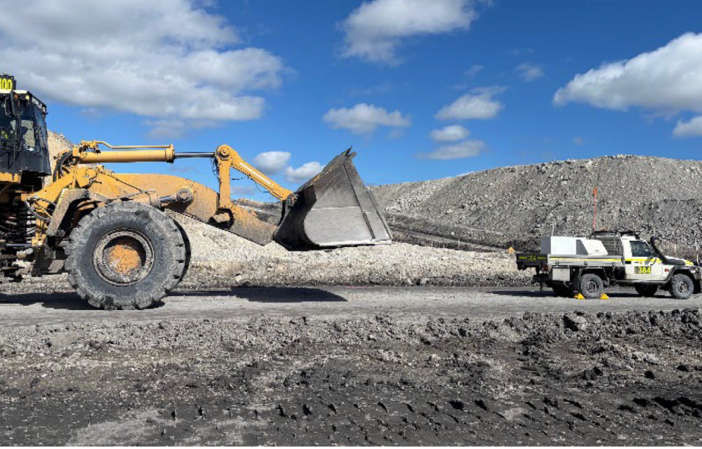 Near miss at NSW mine as distracted loader operator nearly collides with light vehicle, prompting safety alert and call for better traffic controlsarticle image