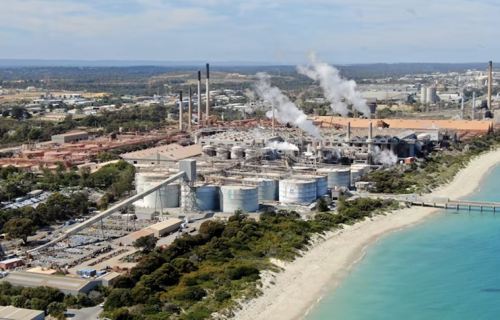 Alcoa has been fined $400,000 after a caustic soda spill at its Kwinana refinery injured workers and students due to failed safety controls and communication lapses.