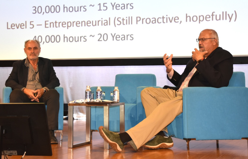 Professor David Williams and Christopher Hatton discussing tailings risk and dam design during the Life of Mine 2025 #LOMMWT2025 keynote in Brisbane