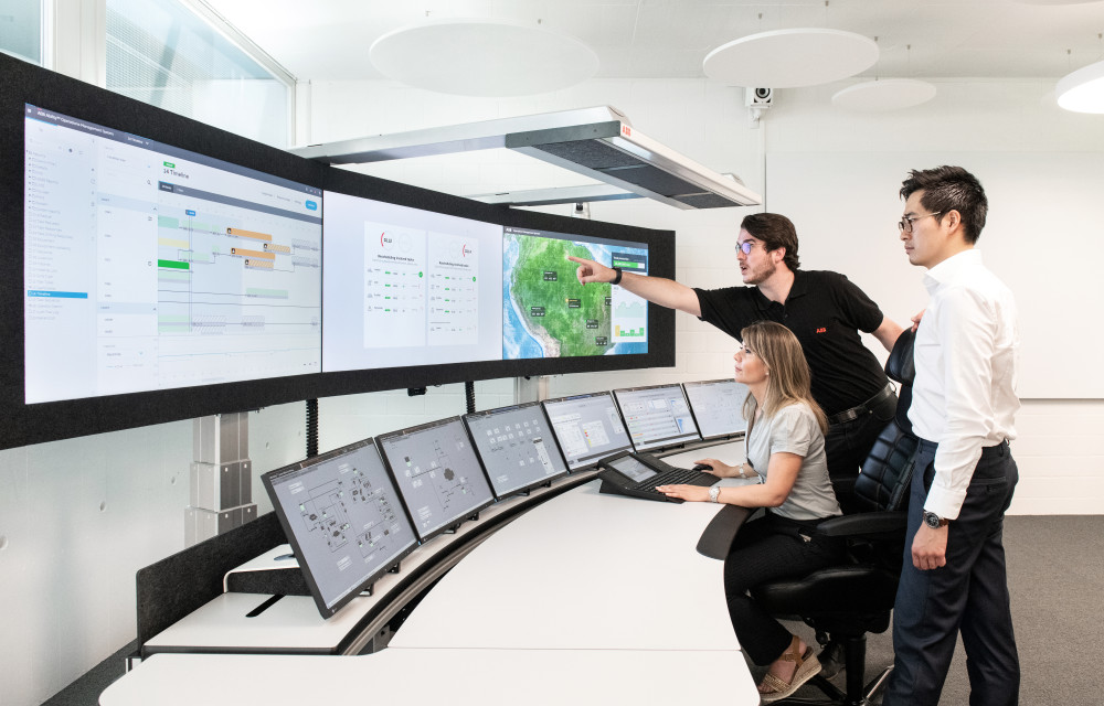 ining control room showing operators using integrated digital systems to coordinate production and optimise underground ventilation.