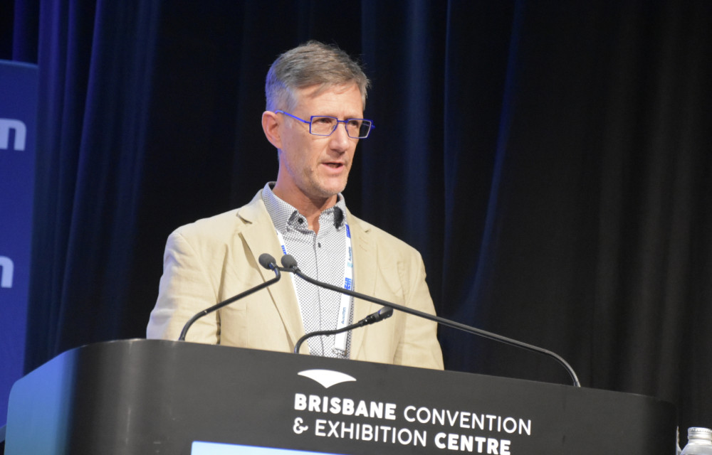 Anton Kirsten presenting his EOR development framework at the Life of Mine | Mine Waste and Tailings 2025 conference in Brisbane, highlighting a structured pathway to grow tailings engineers of record.