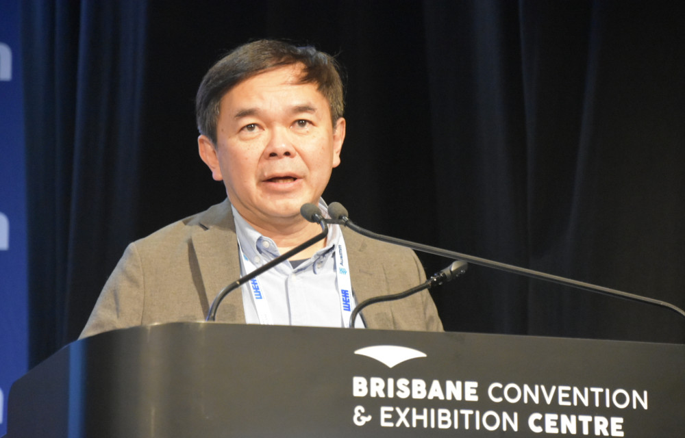 Stephen Darmawan presenting TailingsIQ at the Life of Mine | Mine Waste and Tailings 2025 Conference in Brisbane, highlighting AI innovation in TSF oversight.
