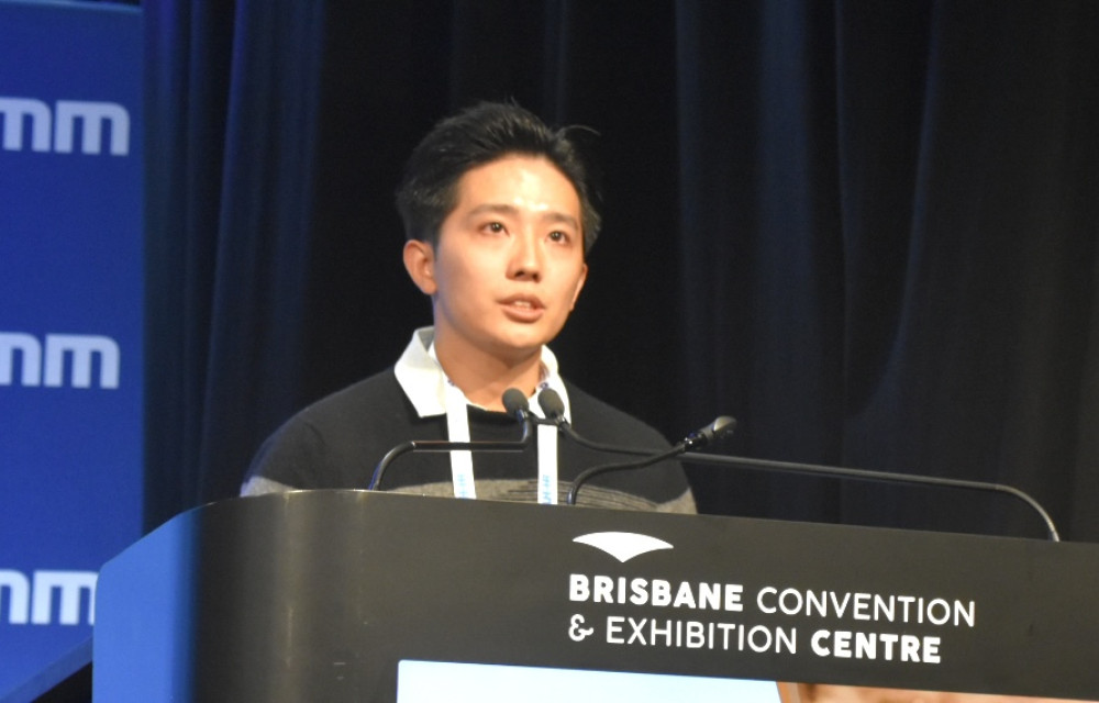 Yue Xiong presenting research on electrical resistance tomography for real time monitoring of tailings slurry density at the Life of Mine Conference 2025 in Brisbane.