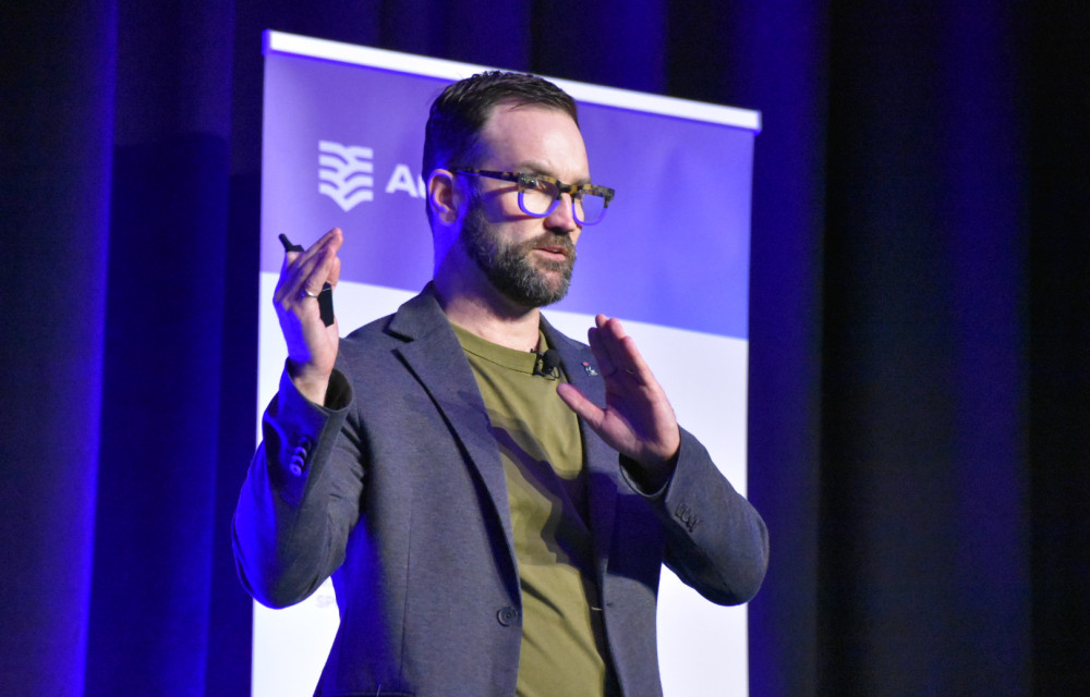 Cam Stevens delivers APCOM 2025 keynote on AI, automation and mining safety, highlighting the need for responsible innovation and human-centred adoption. Picture: Jamie Wade