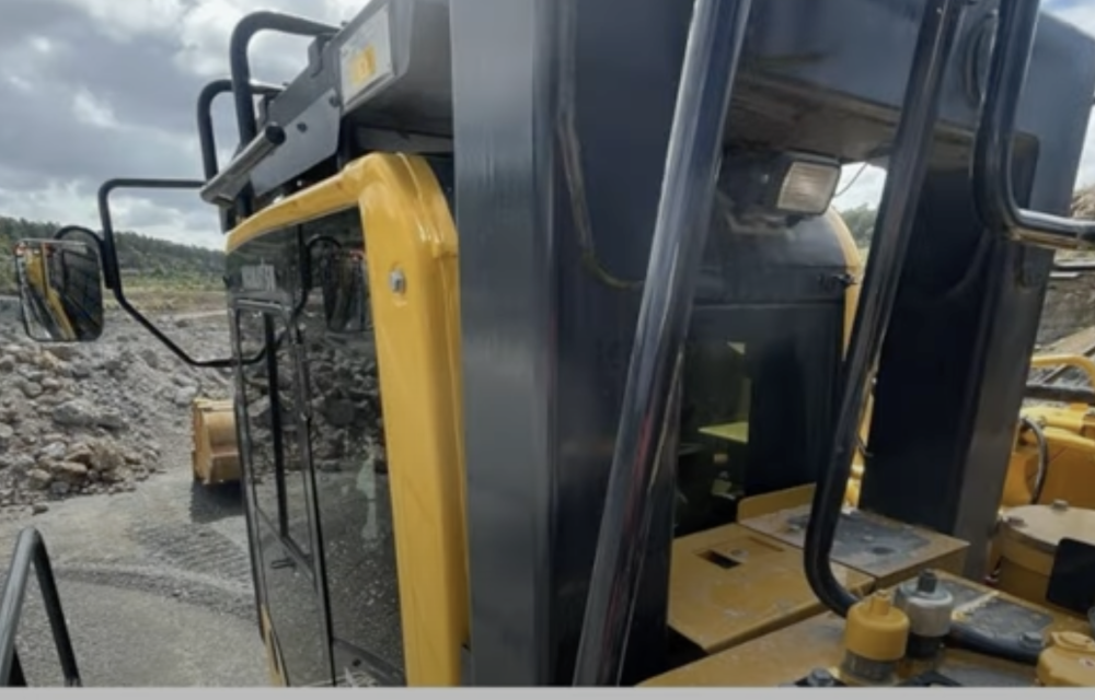 Inspection of excavator ROPS welds showing substandard fabrication and safety risks identified during maintenance.