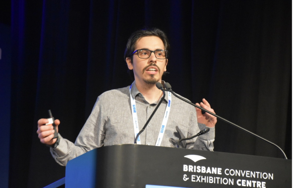 Adolfo de Resende from WSP presenting his research on advanced seiche hazard modelling for in-pit tailings storage facilities at the Life of Mine | Mine Waste and Tailings Conference 2025 in Brisbane.