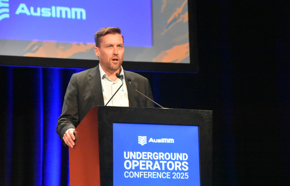 Andrew Hall presenting ESG-driven mine transition strategies at UGOPS 2025, highlighting AMC’s Hill of Value platform for integrated financial and environmental optimisation.