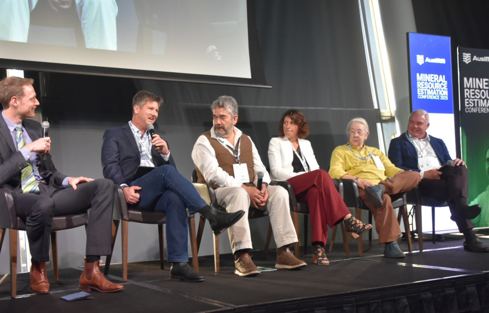 Rene Sterk moderates the Myth-Busting panel at MREC2025 with Mo Srivastava, Flavie Isatelle, Isobel Clark, Clayton Deutsch, and Gustavo Pilger in discussion on estimation practices.